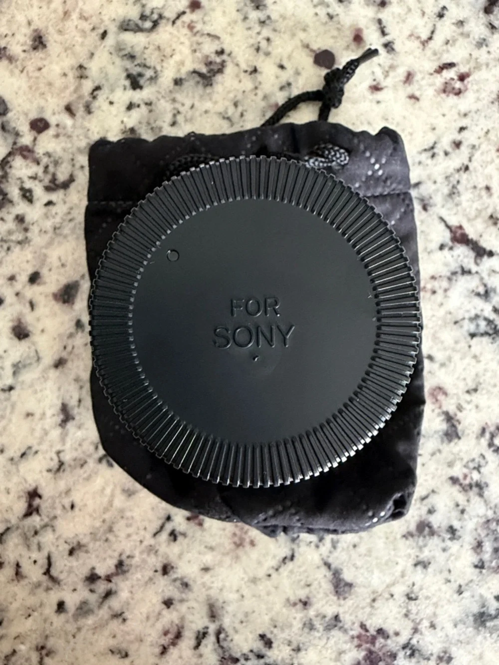 Rokinon 12mm F2 manual focus lens, with hood, and Drawstring Pouch. Sony E mount
